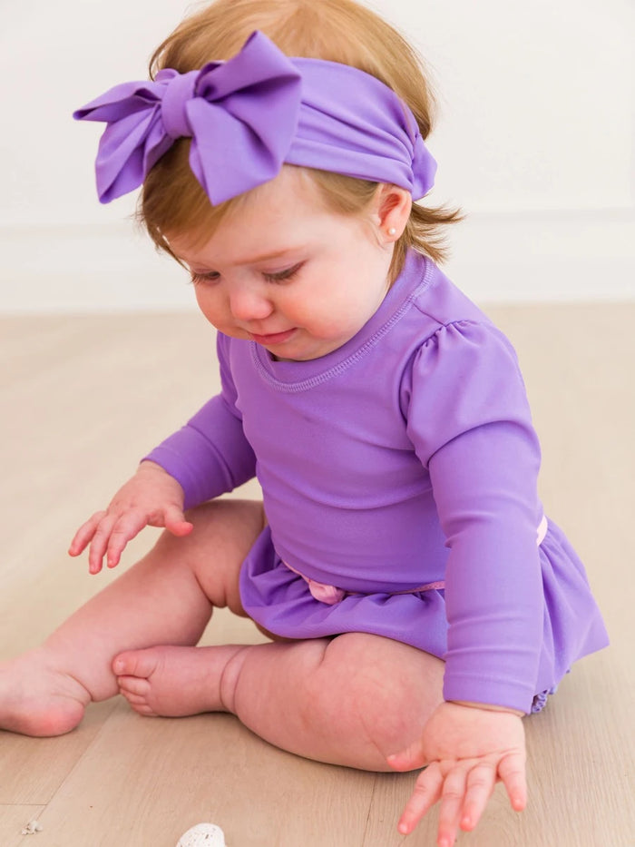 RUFFLEBUTTS TOWER PRINCESS LONG SLEEVE BOW SKIRTED ONE PIECE