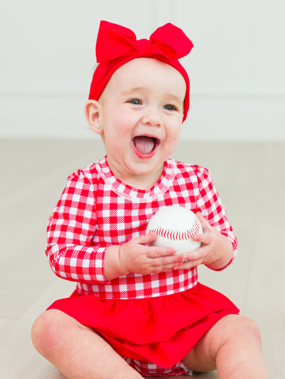 RUFFLEBUTTS VINTAGE RED GINGHAM LONG SLEEVE SKIRTED ONE PIECE RASH GUARD