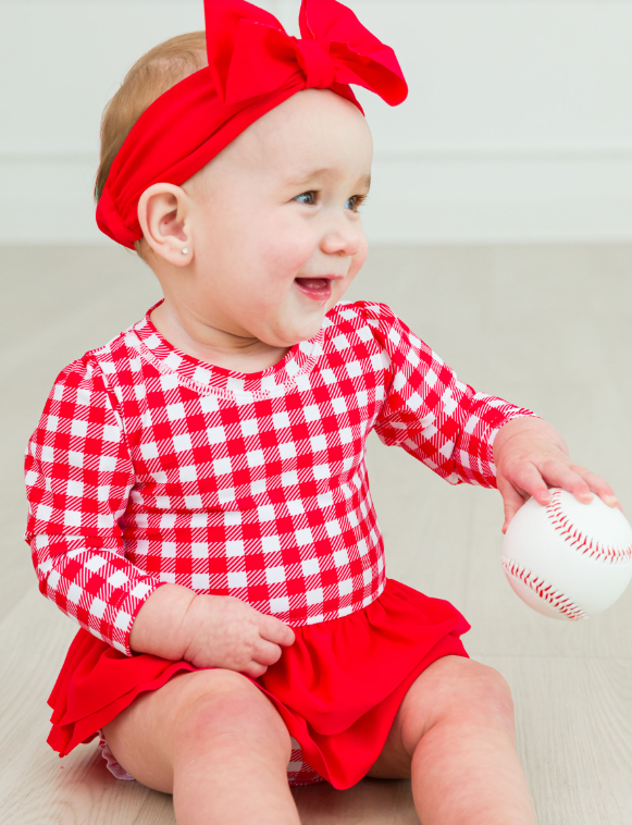 RUFFLEBUTTS VINTAGE RED GINGHAM LONG SLEEVE SKIRTED ONE PIECE RASH GUARD