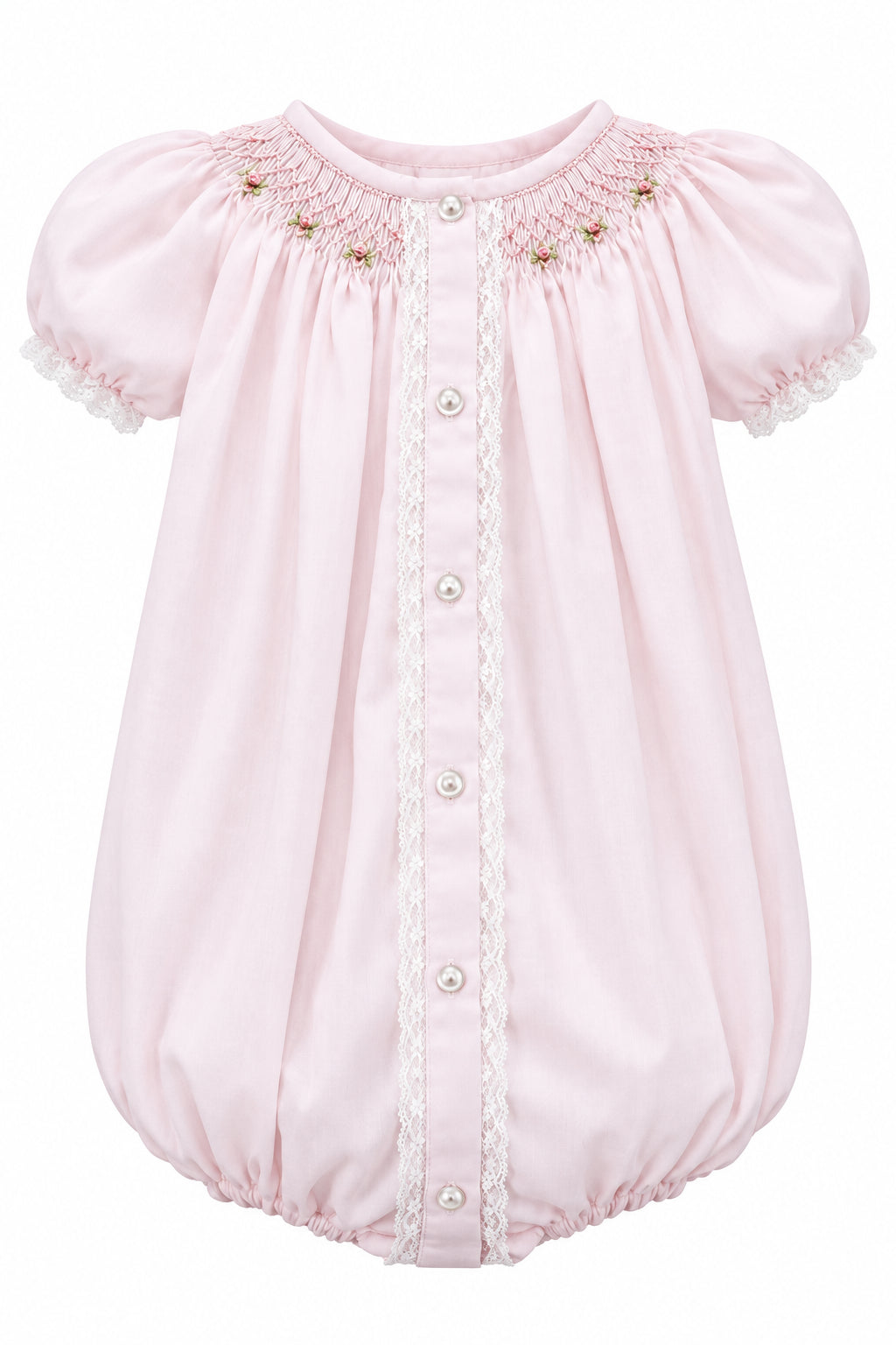 A light pink baby smocked bodysuit with short puff sleeves, lace trim, and a snap-button front, hanging on a white hanger against a neutral gray background.