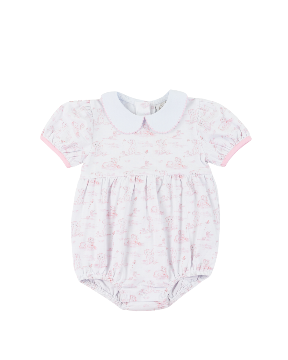 Baby romper with floral pattern and white collar on a white background