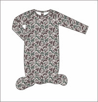 A long-sleeve baby footed sleeper with an all-over camouflage pattern in muted green, brown, and beige, shown flat against a white background.