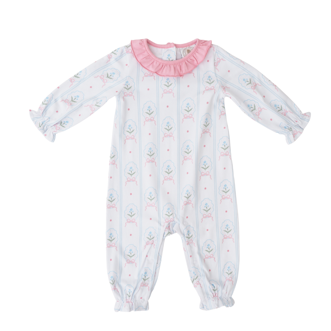 Baby onesie with pink collar on a white background