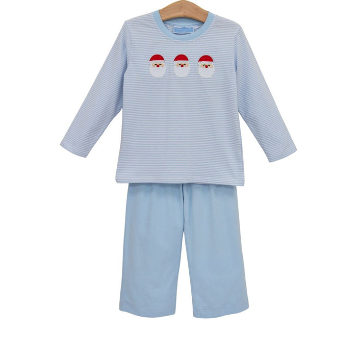 Children's light blue pajama set with Santa Claus design on a white background