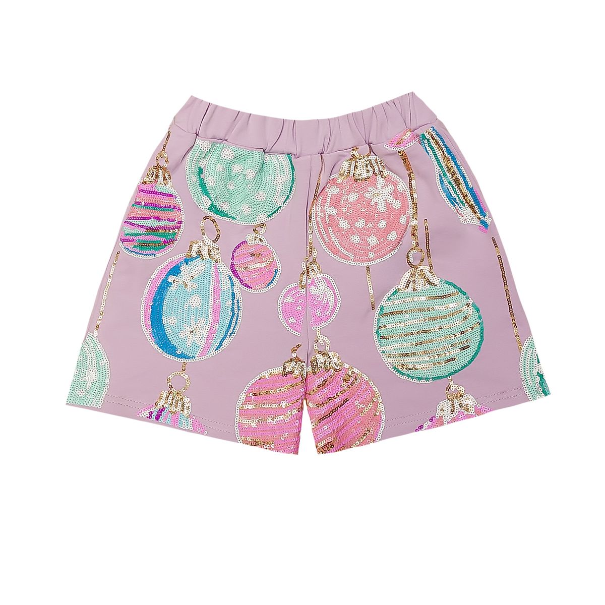 A pair of girls' shorts in lavender pink, decorated with a festive sequin Christmas ornament print in pink, mint green, and blue, set against a plain white background.