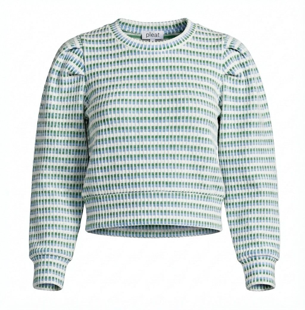 Patterned sweater with a visible brand label on a white background