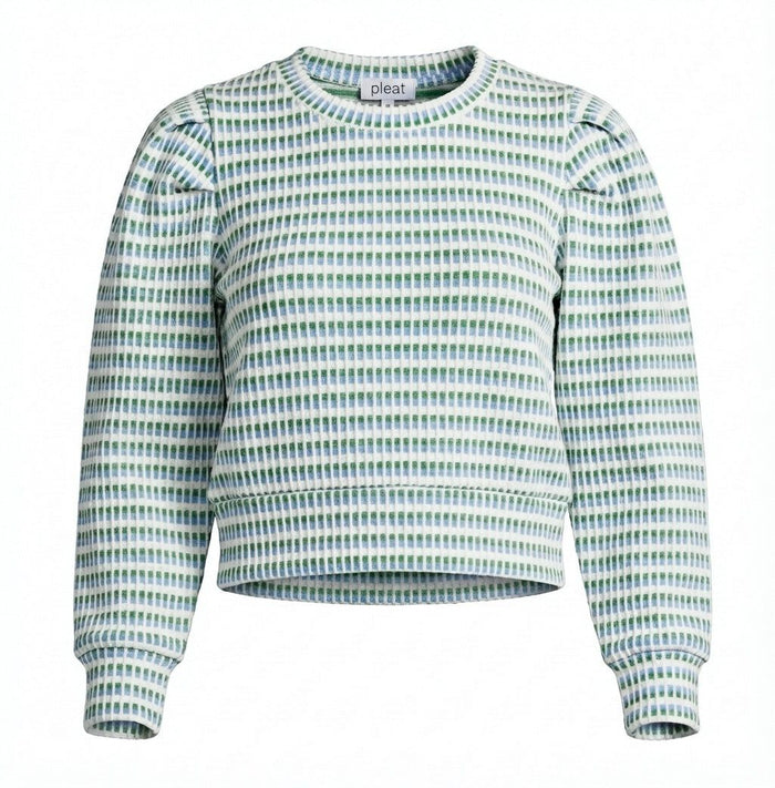 Patterned sweater with a visible brand label on a white background
