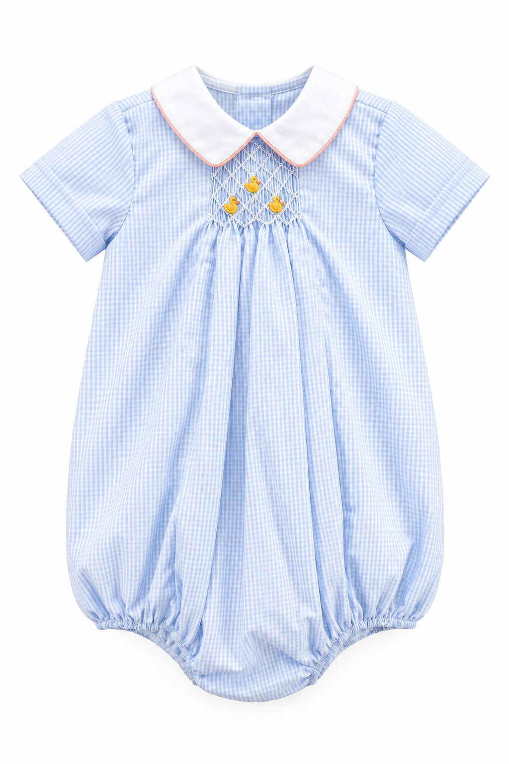 A baby boy's short-sleeve romper in a light blue and white gingham pattern, featuring a white collar with a thin orange trim, smocked detailing at the chest with three small yellow flowers, and elasticated leg cuffs.