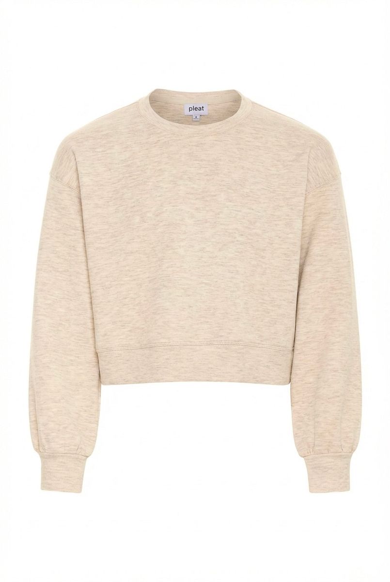 Beige sweater with a brand label on a white background