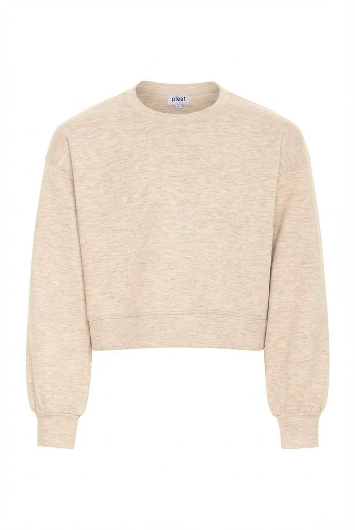 Beige sweater with a brand label on a white background