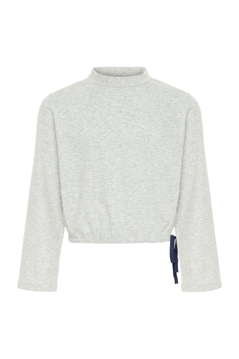 Light gray sweater with a high collar on a white background