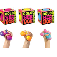 Color Nee Doh toy with packaging and hands holding the toy in different colors.