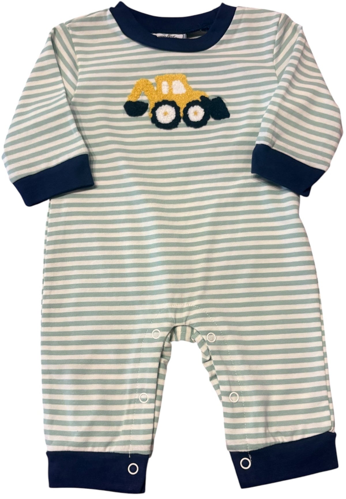 A baby long-sleeve romper with thin green and off-white horizontal stripes, featuring a yellow construction truck applique on the chest and navy blue trim at the collar, cuffs, and ankles.