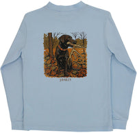 A light blue long-sleeve t-shirt with a graphic print of a black Labrador retriever holding a duck in its beak, standing in an autumn forest. The text 'J.