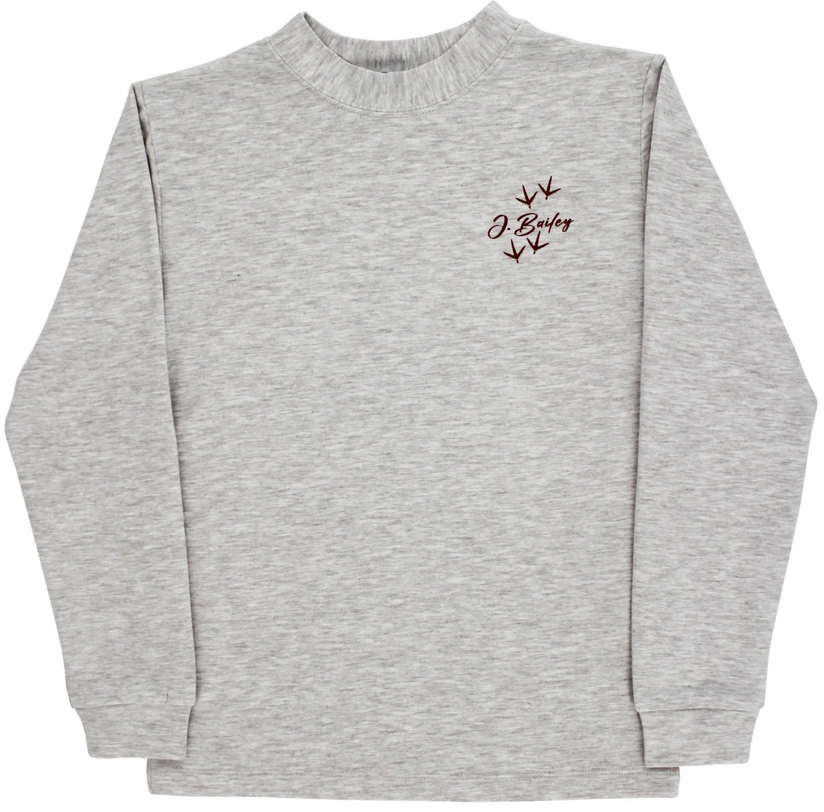 A light heather gray crewneck sweatshirt with a small dark red graphic on the left chest featuring the text 'J Byjag' and three arrows pointing downward.