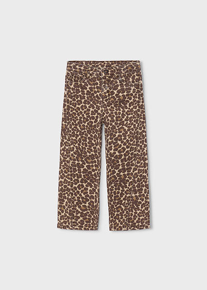 A pair of cropped pants featuring a brown and beige leopard print pattern, displayed flat against a light gray background.