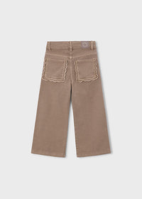 A pair of wide-leg cropped pants in a warm taupe-brown color, shown from the back. The back pockets feature a distinctive scalloped edge and matching scalloped embroidery.