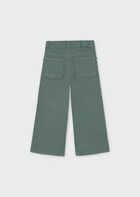 A pair of muted sage green wide-leg pants shown from the back, featuring decorative scalloped stitching around the two back pockets, on a light gray background.