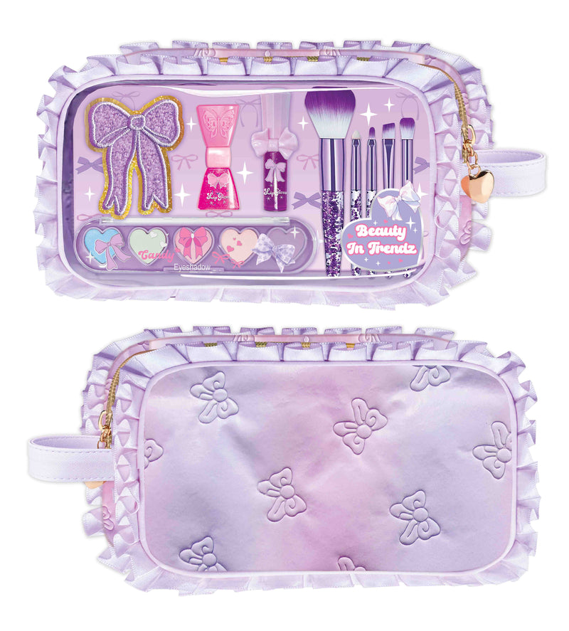 Makeup set with a purple case featuring decorative elements on a white background