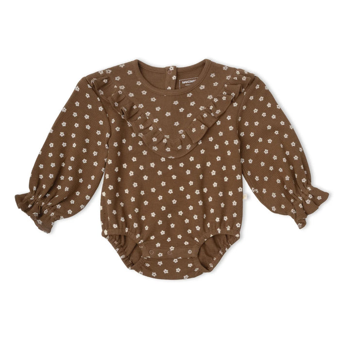Brown floral-patterned baby romper on a white background