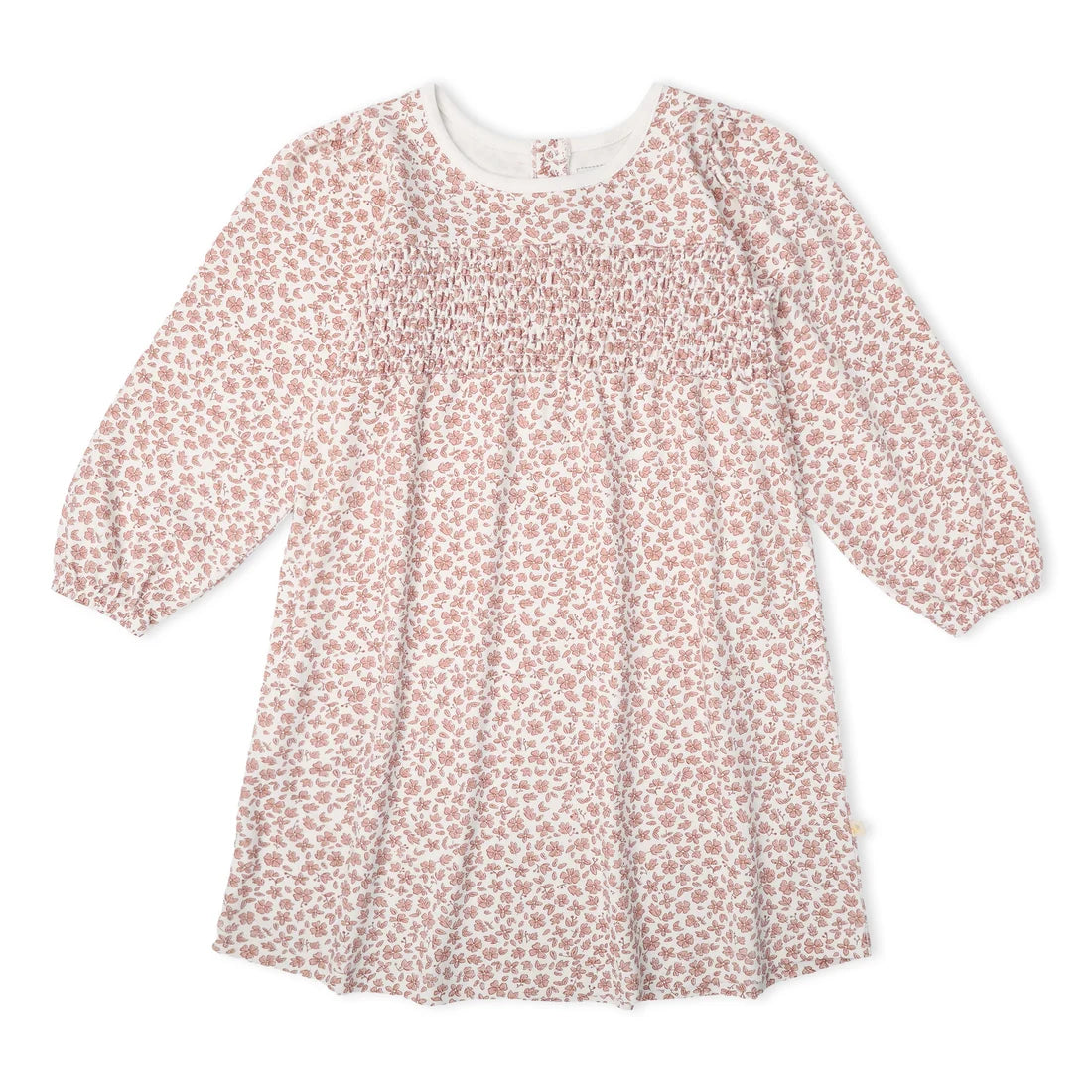 A long-sleeve baby dress with a smocked chest and an all-over small floral print in dusty pink and white, shown flat on a white background.