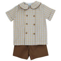 A toddler boy's two-piece outfit consisting of a short-sleeve double-breasted shirt with a beige and white gingham pattern and brown buttons, paired with solid brown shorts.