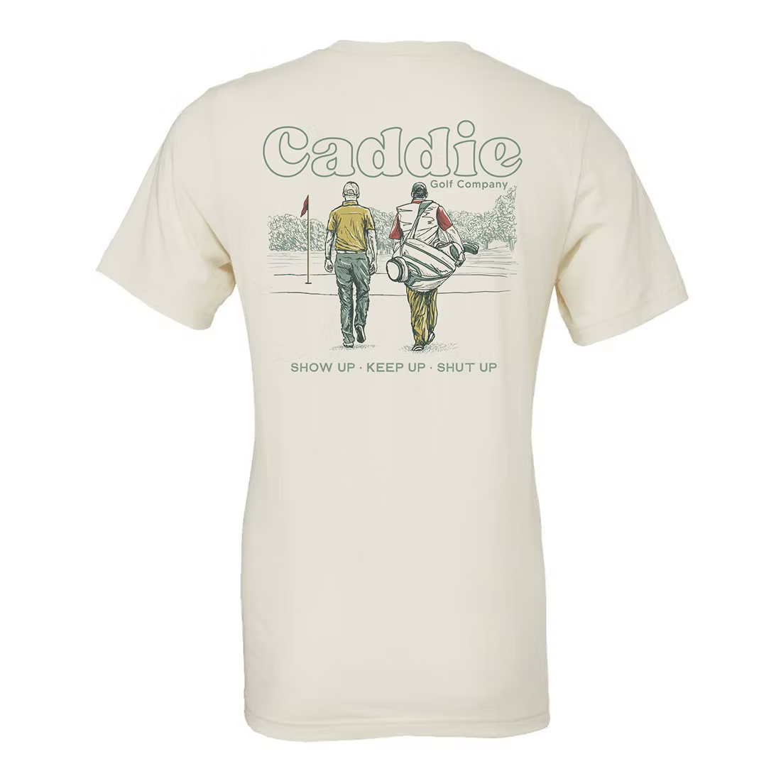 The back of an off-white t-shirt featuring a golf-themed graphic print with the text 'Caddie Golf Company' and 'SHOW UP • KEEP UP • SHUT UP' above and below an illustration of two golfers on a course.