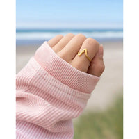 ELEVATED FAITH WAVY CROSS RING