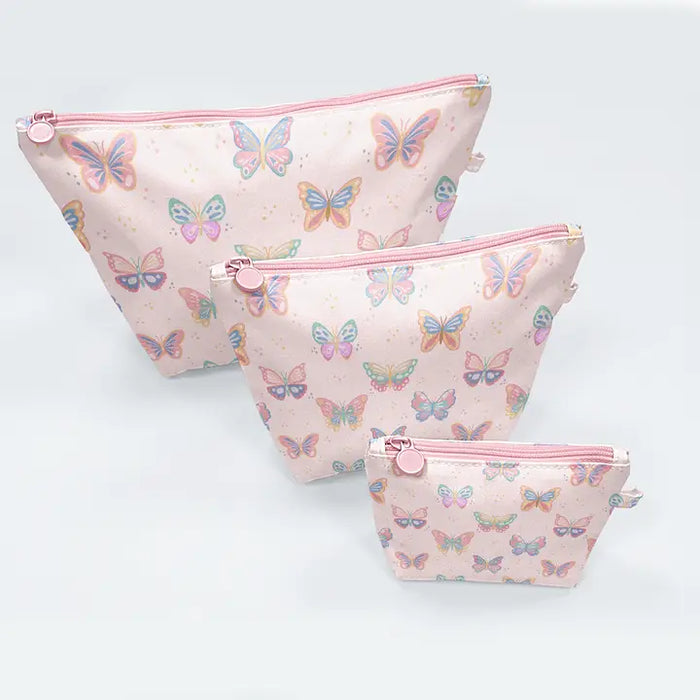 Three pink pouches with butterfly pattern on a light gray background