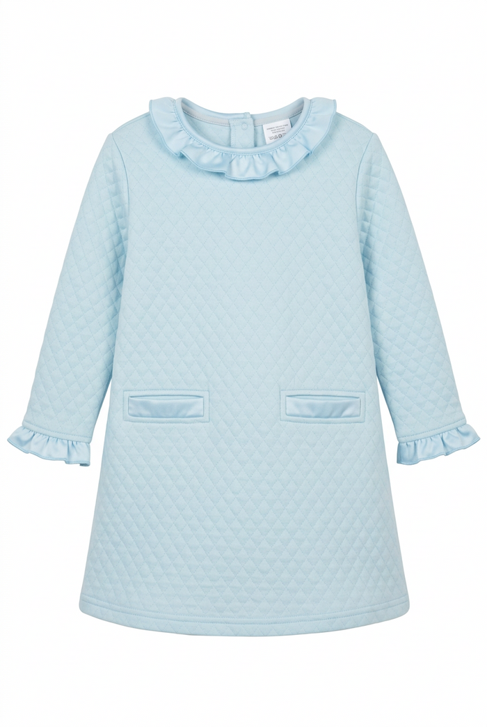 A light blue quilted long-sleeve dress for toddlers, featuring a ruffled collar, ruffled cuffs, and two front patch pockets, shown against a plain white background.
