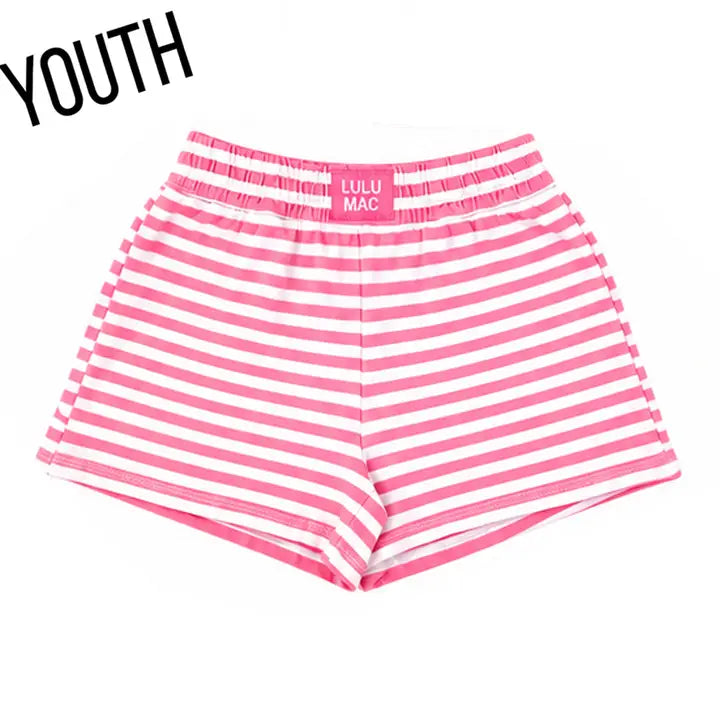 Pink and white striped youth shorts with an elastic waistband, featuring the brand name 'LULU MAC' printed on the inside waistband. The word 'YOUTH' is written in black text in the top-left corner.