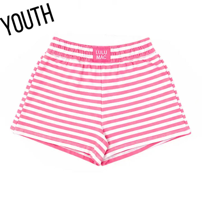 Pink and white striped youth shorts with an elastic waistband, featuring the brand name 'LULU MAC' printed on the inside waistband. The word 'YOUTH' is written in black text in the top-left corner.