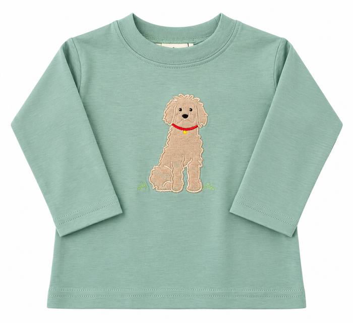 A mint green long-sleeve baby t-shirt featuring an embroidered beige poodle dog wearing a red collar on the front, displayed against a solid white background.