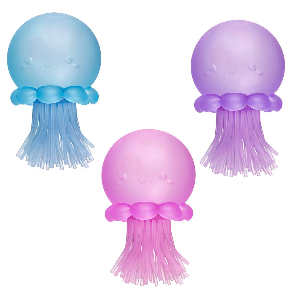 Three jellyfish-shaped scrubbers in blue, pink, and purple on a white background