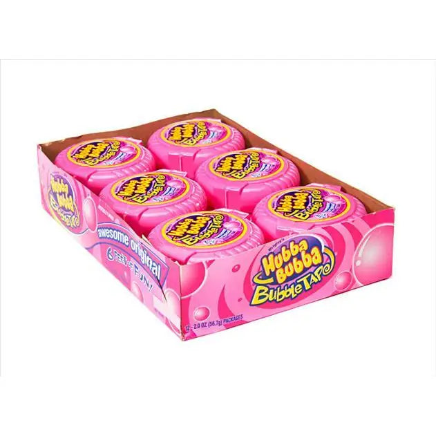 A cardboard display box containing six pink rolls of Wubba Bubba Bubble Tape gum, photographed on a plain white background.