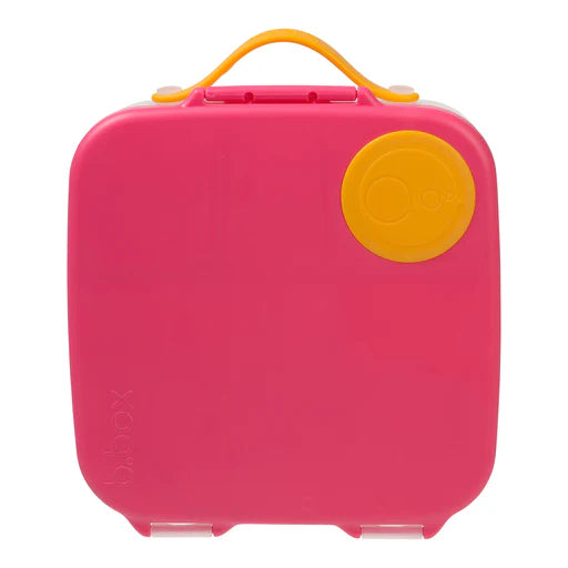 Pink lunch box with yellow handle and lid on a white background