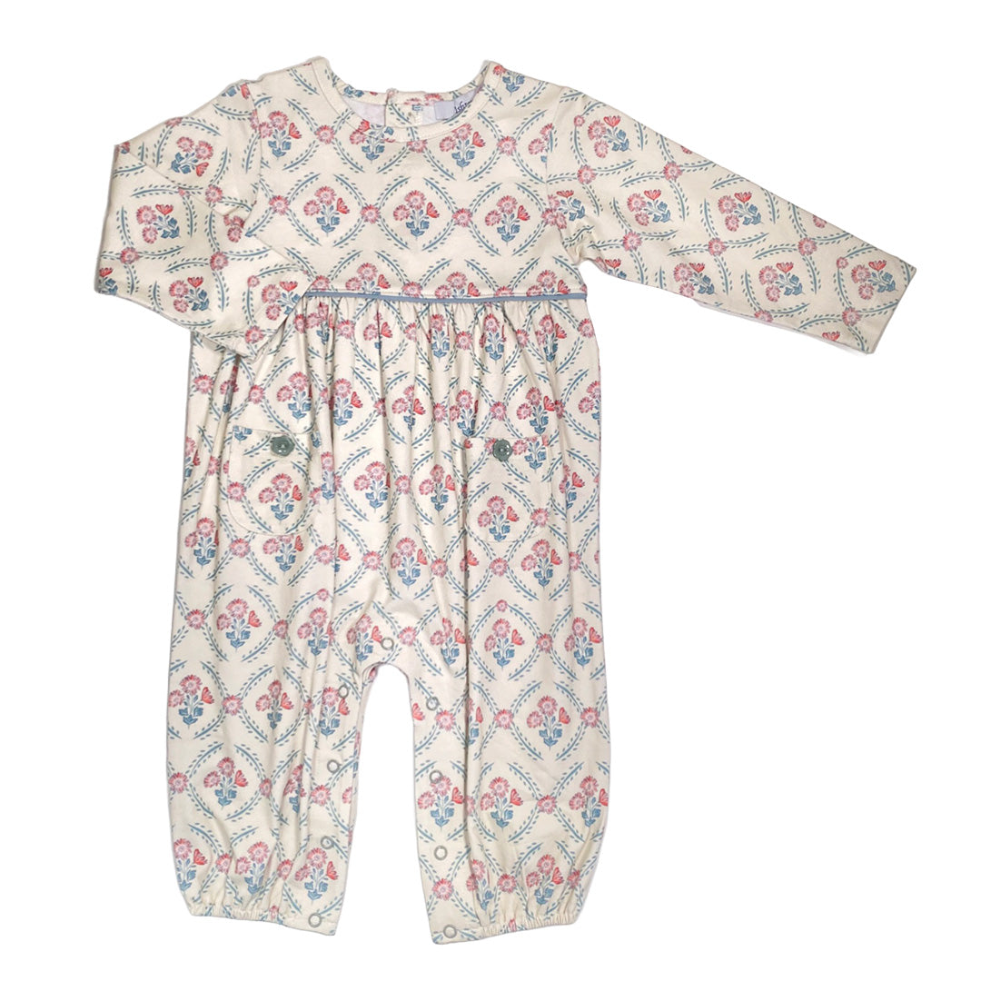 Floral patterned baby romper on a white background