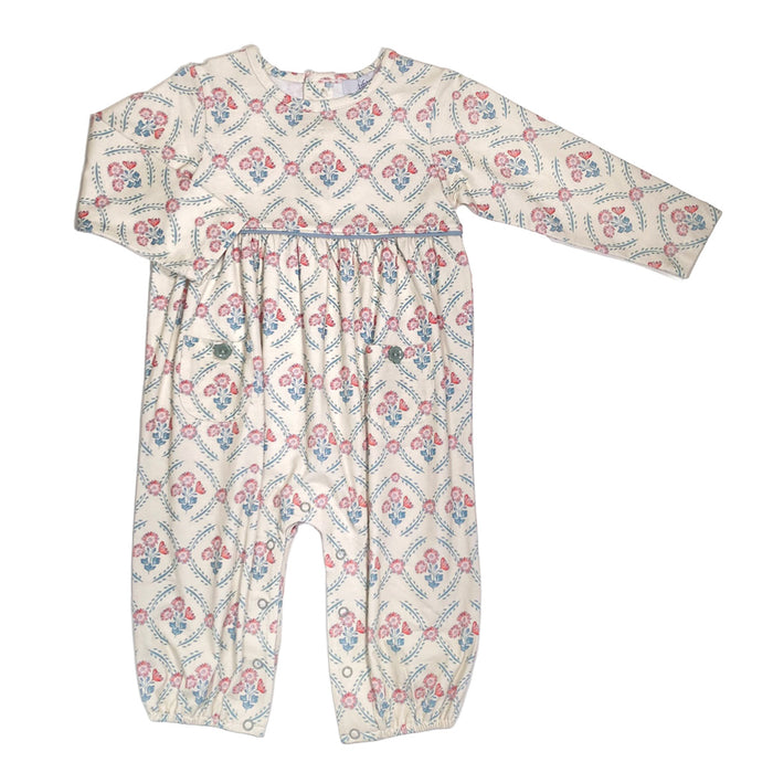 Floral patterned baby romper on a white background