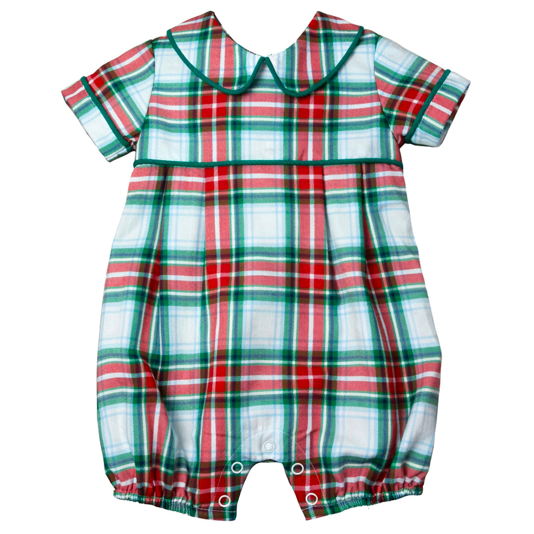 Plaid baby romper with red, green, and white colors on a white background