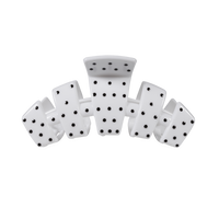 Set of six white dice with black dots on a white background