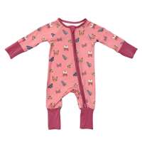 Pink baby onesie with butterfly pattern on a white background