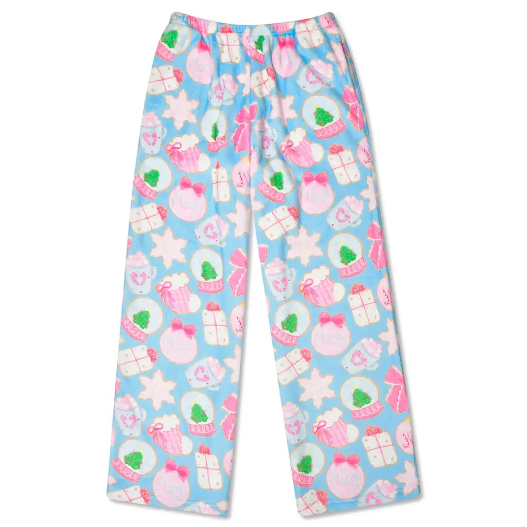 Colorful pajama pants with a pattern of stars, hearts, and gift boxes on a light blue background.