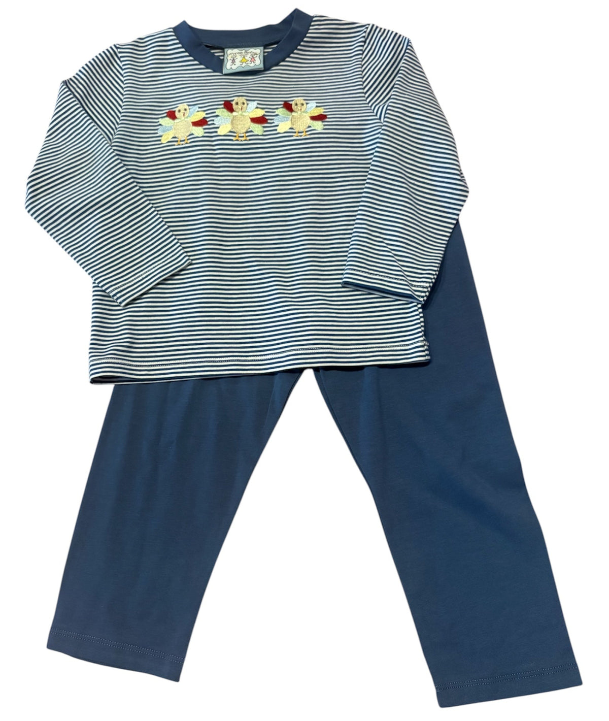 A two-piece children's pajama set featuring a long-sleeve top with thin navy and white horizontal stripes, three embroidered polar bear motifs across the chest, and solid navy blue pants.