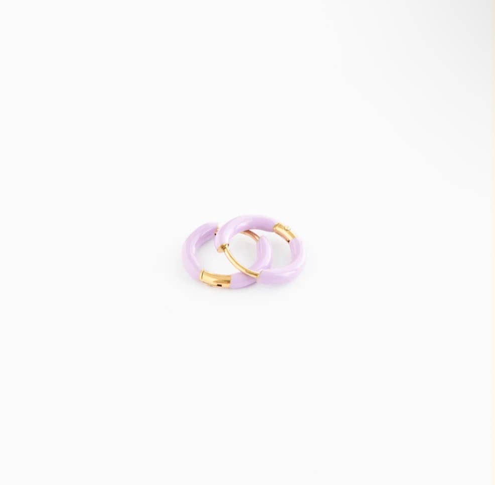 Purple hoop earrings with gold accents on a white background