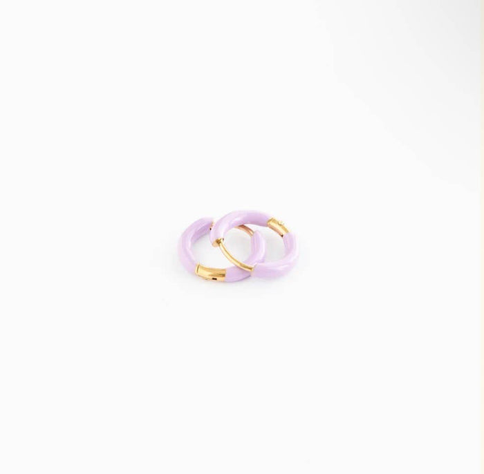 Purple hoop earrings with gold accents on a white background