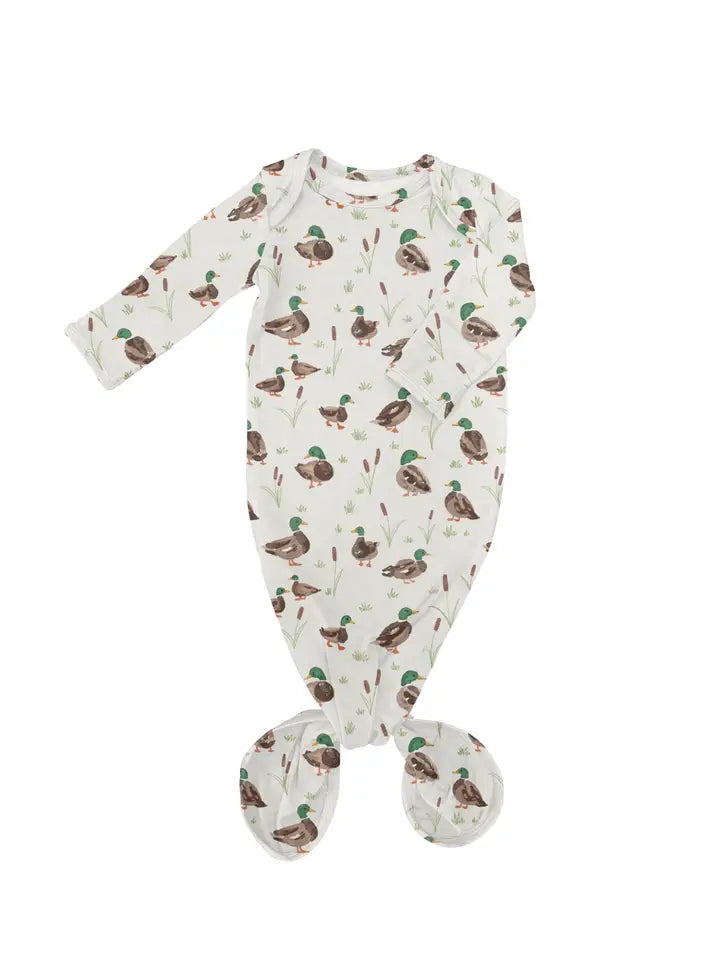 Baby Gown with duck pattern on a white background