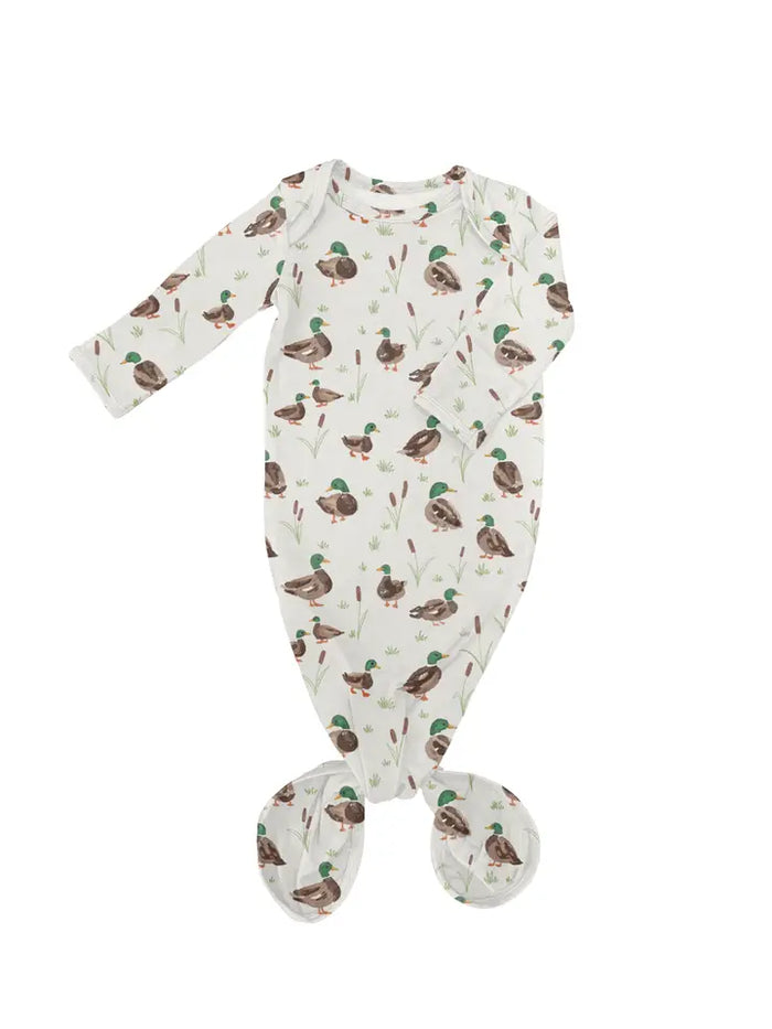 Baby Gown with duck pattern on a white background