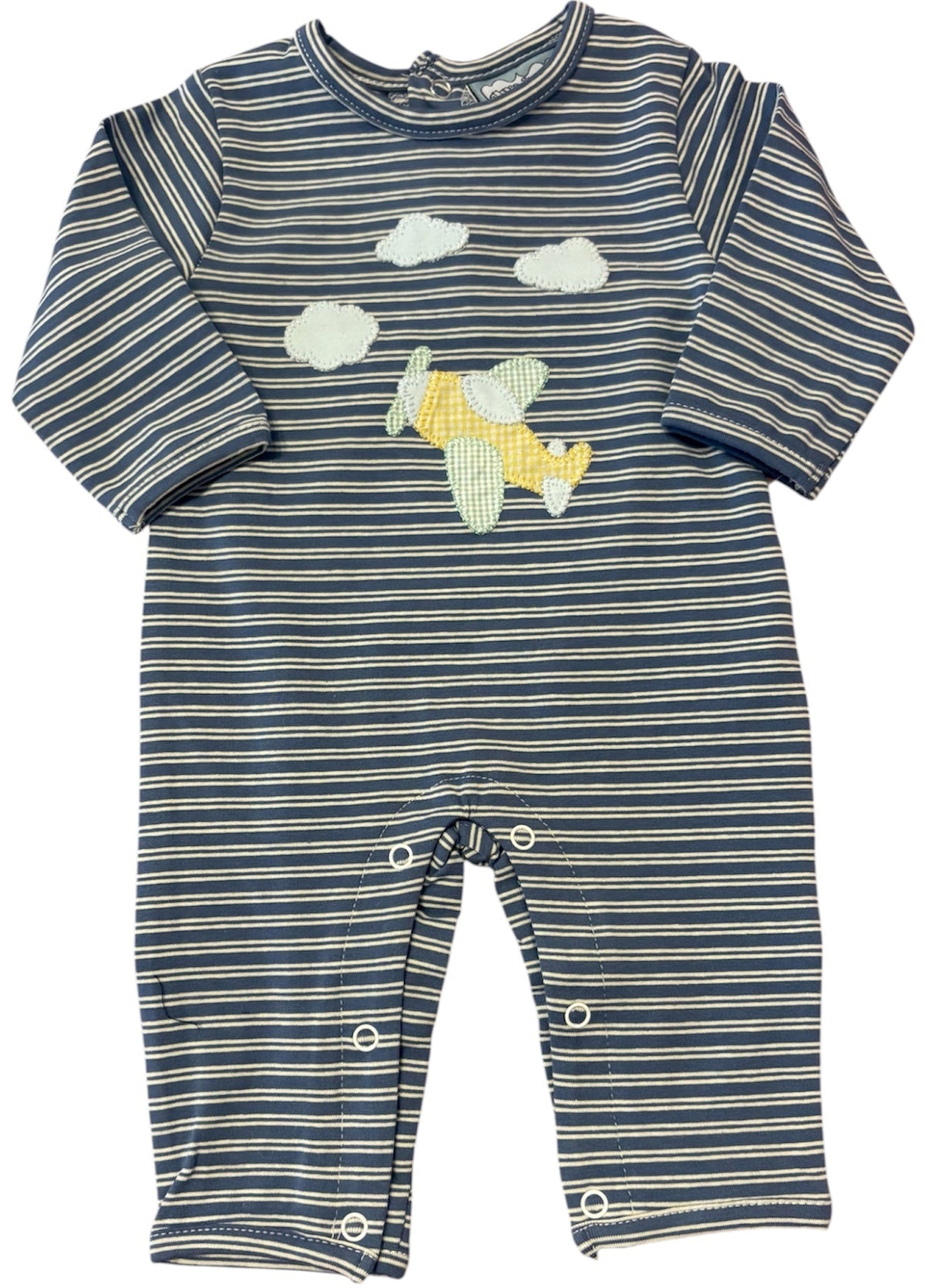 A baby long-sleeve romper with navy and beige horizontal stripes, featuring a yellow and white airplane applique and white cloud appliques on the chest, shown against a plain white background.