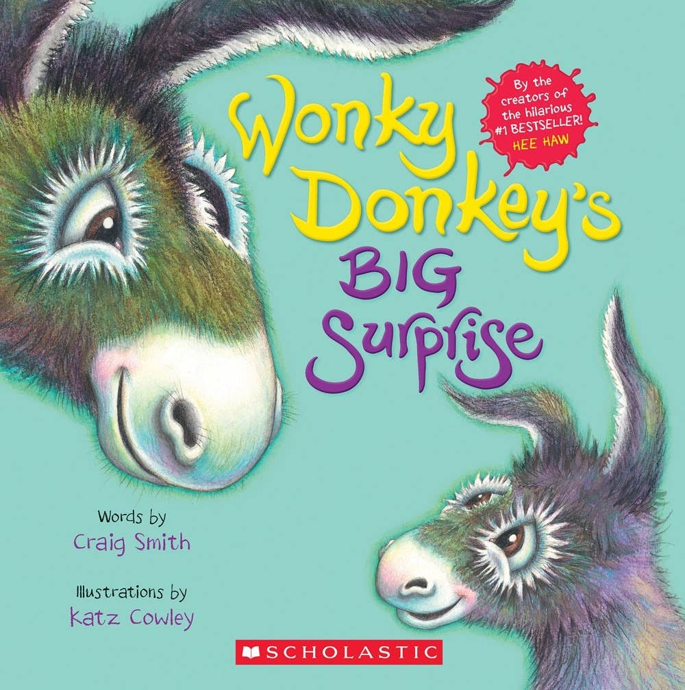 Book cover of 'Wonky Donkey's Big Surprise' with illustrations of donkeys and Scholastic logo.