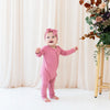 KYTE BABY ZIPPERED ROMPER IN APPLE BLOSSOM